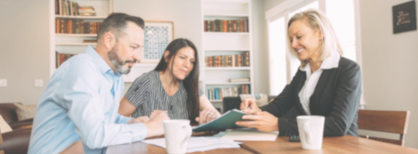 Parents with Agent helping them Choose an Adoption Agency